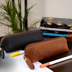 Discover the perfect blend of style, functionality, and craftsmanship with our bespoke leather pencil roll cases. Designed for artists, designers, and stationery enthusiasts who value both elegance and practicality, these custom-made cases are the ultimate solution for storing and organizing your precious pencils and drawing tools. Crafted from premium, full-grain leather, each pencil roll case is meticulously handmade by skilled artisans who take pride in their work. The supple, durable leather Leather Pencil Pouch, Leather Pencil Roll, Leather Pen Holder, Logo Pen, Pencil Roll, Pen Bag, Fine Stationery, Back To School Gift, School Gift