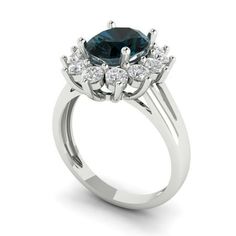 Style: Three-Stone / Solitaire with Accents Stone: Natural Swiss Blue Topaz Main Stone Shape: Round Cut Main Stone Carat Weight: 1.0 Side Stone 1 Shape: Baguette Cut Side Stone 1 Carat Weight: 0.25 Side Stone 1 Size: 5x3x2mm Side Stone 1 Quantity: 2.0 Side Stone 2 Shape: Round Cut Side Stone 2 Carat Weight: 0.03 Side Stone 2 Size: 2.0mm Side Stone 2 Quantity: 12.0 Side Stone 3 Shape: Round Cut Side Stone 3 Carat Weight: 0.015 Side Stone 3 Size: 1.5mm Side Stone 3 Quantity: 12.0 Side Stone 4 Shap Yellow Gold Solitaire Ring, Cubic Zirconia Engagement Rings, Wedding Ring Sizes, Gold Solitaire Ring, Blue Tanzanite, Engagement Ring Sizes, Gold Engraving, Gold Halo, Sky Blue Topaz