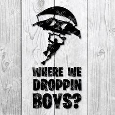 a sign that says where we dropin boys? on a wooden background with an image of a man falling from a parachute