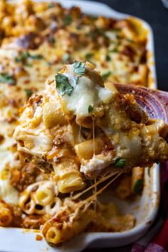 an easy baked ziti with ricotta in a casserole dish on a plate