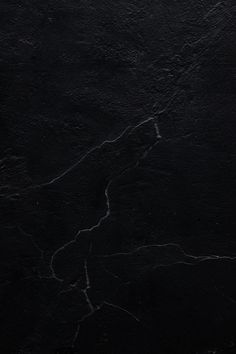 black marble textured background with dark colors