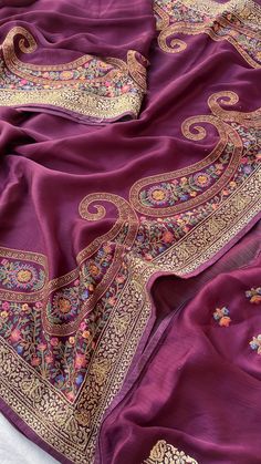 Wine  Satin Silk Embroidery Saree with Swarovski Work Material and Fabric: High-quality satin silk fabric Luxurious, smooth, and glossy texture Design and Embroidery: Intricate embroidery detailing throughout the saree Embellished with genuine Swarovski crystals for an added sparkle Color and Appearance: Vibrant Wine color that stands out in any setting Rich, elegant look suitable for various occasions Versatility: Perfect for official parties, ensuring you look sophisticated and stylish Ideal for Bollywood-themed events, giving you a glamorous and trendy appearance Comfort and Wearability: Lightweight and easy to drape, offering comfort without compromising on style Soft fabric that feels gentle on the skin, making it suitable for long hours of wear Care Instructions: Dry clean only to ma Wine Saree, Saree Satin, Bollywood Theme Party, Bollywood Theme, Look Sophisticated, Saree Designer, Embroidered Saree, Embroidery Detailing, Embroidery Saree