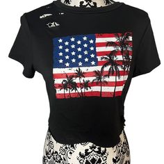 New 4th Of July Crop Top Distressed American Flag Crop Top Palms Trees Crop Top Pet Smoking Free Home Patriotic Crop Top Usa Crop Top Black Flag Print Top For Summer, Black Tops With Flag Print For Summer, Spring Beach Tops With Flag Print, Black Tops With American Flag Print For Summer, Black Summer Top With American Flag Print, 4th Of July Vacation Tops With Short Sleeves, Short Sleeve Tops For 4th Of July Vacation, Vacation Tops For 4th Of July With Short Sleeves, Summer Vacation Tops With American Flag Print