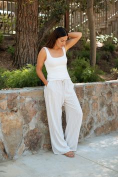 Slip into casual and comfy style with our Island Linen Pants! Crafted from a linen and rayon blend, these pants feature a roomy, relaxed fit and a functional drawstring for the perfect fit. The wide straight leg design adds a touch of relaxed elegance, making them ideal for any casual day. Perfect for lounging at home or going out, these are the pants you'll want to live in! Early Fall Collection FIT Made in Los Angeles Easy Relaxed, Roomy Fit Adjustable Tie Strings Stretchy Waistband Pockets Br Relaxed Elegance, Maternity Shops, Basic Dress, Kimono Cardigan, Early Fall, Comfy Fashion, Leg Design, Kimono Dress, Denim Jean Jacket