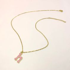 Add a touch of personality and whimsy to your look with our Personalized Pink Initial Necklace. This charming necklace features a custom letter of your choice, crafted with a gold-plated finish and filled with vibrant pink enamel. The delicate chain complements the playful letter, creating a cheerful and eye-catching piece. Perfect for everyday wear or as a gift, this necklace is a delightful way to express your unique style. Initial Necklace Gold, Pink Enamel, Delicate Chain, Custom Earrings, Custom Letters, Custom Bracelets, Custom Necklace, Initial Necklace, Custom Rings