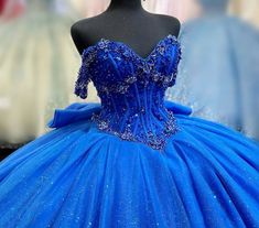 Royal Blue Ball Gown For Quinceanera During Prom Season, Blue Embellished Fitted Quinceanera Dress, Blue Embellished Ball Gown Quinceanera Dress, Blue Embellished Quinceanera Dress For Party, Embellished Blue Quinceanera Dress For Party, Blue Quinceanera Gown With Sweetheart Neckline, Blue Quinceanera Dress With Fitted Bodice For Pageant, Blue Sweetheart Neckline Dress For Sweet 16, Embellished Princess Style Quinceanera Dress