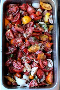 a pan filled with lots of different types of vegetables