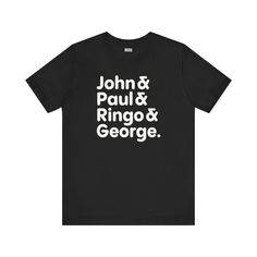 a black t - shirt with white lettering that says john paul and ringo & george