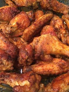 chicken wings cooking in a frying pan