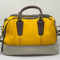 This Is A Large Oryany Crossbody Bag, Which Is Brand New. The Bag Measures 15 Inches Wide, By 11.5 Inches Tall. The Body Is All Pebble Leather, With Gold Tone Hardware. The Main Body Color Is A Beautiful Yellow, With A Taupe Bottom, And Dark Brown Leather Around The Zippers And Zipper Pulls. There Are 3 Large Zippered Compartments To The Main Bag, With Smaller Side Compartments Inside Of The Center Compartment. It Is Much Nicer Than A Tote Bag, And Will Hold Almost As Much! Modern Yellow Satchel With Gold-tone Hardware, Modern Yellow Shoulder Bag With Handle Drop, Modern Yellow Bags With Gold-tone Hardware, Yellow Satchel Shoulder Bag With Detachable Strap, Luxury Yellow Shoulder Bag For Everyday, Yellow Rectangular Satchel With Detachable Strap, Modern Yellow Leather Shoulder Bag, Designer Yellow Satchel With Detachable Strap, Luxury Yellow Satchel With Gold-tone Hardware