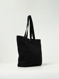 Bags CARHARTT WIP Men color Black Classic Black Rectangular Canvas Bag, Classic Black Canvas Bag, Black Canvas Bag With Snap Closure, Classic Black Bag With Flat Pocket, Black Tote Bag With Flat Pocket, Black Travel Bag With Flat Pocket, Black Rectangular Bag With Flat Pocket, Black Everyday Bag With Flat Pocket, Black Everyday Bags With Flat Pocket