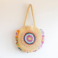 In stock fast shipping from Los Angeles! The Elena Handbags Boho Round Beach Straw Tote is the perfect accessory to elevate your summer style. Handcrafted with eco-friendly woven straw, this stunning boho shoulder bag is sure to make a statement whether you're beach-going, yoga-practicing or running everyday errands. Carry your essentials in style with this chic and sustainable tote. Zipper closureFully linedInside pocketStrap drop: 11 inchesSize: 17.5 in diameter Designer Style ID: 8627 Boho Round Beach Woven Bag, Handmade Straw Woven Shoulder Bag, Summer Beach Bag Bohemian Beige Beach Bag With Braided Handles, Bohemian Straw Bag With Adjustable Strap For Everyday Use, Bohemian Bags With Adjustable Strap For Beach Season, Bohemian Straw Shoulder Bag With Braided Handles, Bohemian Bags For Everyday Summer Use, Bohemian Beige Shoulder Bag For Beach Season, Bohemian Natural Beach Bag For Everyday Use, Bohemian Beige Straw Bag For Spring, Bohemian Beige Shoulder Bag For The Beach