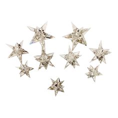 six silver stars on a white background