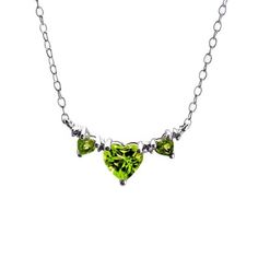 Perfect for the August princess, this triple-heart necklace is certain to make her birthday - or any day - a special one. Fashioned in sleek sterling silver, three heart-shaped spring-green peridots sparkle in a neat row, separated only by shimmering diamond accents. Polished to a brilliant shine, this 18.0-inch cable chain necklace secures with a spring-ring clasp. Silver Diamond Necklace, Peridot Jewelry, Silver Necklaces Women, Cable Chain Necklace, Sterling Silver Cross Pendant, Diamond Jewelry Necklace, Peridot Stone, Special One, Sterling Silver Cross