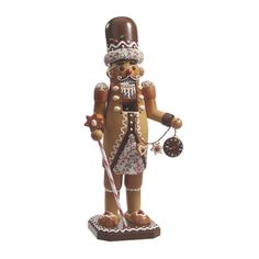 a nutcracker is holding a candy cane