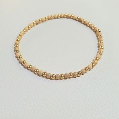 **Get Lower Prices On Our Website!! - Bochellijewelry.Com - (Not On Here On Our Own Website) ***This Is A Handmade Item And Is Stamped 14k On The Clasp*** This Listing Is For One Solid 14k Alternating 3mm Polished Gold Stardust Bead Bracelet 14k Solid Yellow Or Rose Gold 3mm Polished Round Beads (2-12mm Also Avail C Shop) - White Gold Is Not Available. 14k Solid Yellow Or Rose Gold 3mm Stardust Round Beads (2-12mm Also Avail C Shop) - White Gold Is Not Available. Choose Stretchy Or 14k Solid Yel 14k Gold Yellow Rondelle Beaded Bracelets, Dainty Yellow Gold Bracelets With Spacer Beads, Yellow Gold Bracelet With Tiny Beads For Everyday, Everyday Yellow Gold Bracelet With Tiny Beads, Elegant Yellow Gold Bracelet With Tiny Beads, Yellow Gold Bracelets With Tiny Beads, Adjustable Yellow Gold Bracelet With Spacer Beads, Gold Rondelle Bracelets With Tiny Beads, 14k Yellow Gold Beaded Bracelet