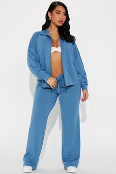 Available In Hunter, Cream, Blue, And Black. Pant Set Super Soft Knit Zip Front jacket Wide Leg Pant Drawstring Waist Pockets Stretch 47% Polyester 46% Rayon 7% Spandex Imported | Tia Super Soft Pant Set in Blue size Small by Fashion Nova Solid Stretch Outerwear For Loungewear, Stretch Solid Color Outerwear For Loungewear, Fitted Blue Outerwear For Loungewear, Blue Activewear For Fall Loungewear, Blue Activewear For Loungewear In Fall, Versatile Stretch Blue Outerwear, Blue Relaxed Fit Athleisure Outerwear, Service Women, Soft Pants