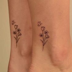 two small tattoos on the legs of women