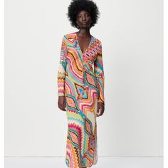 Most Wanted Zara Maxi Dress Vibrant Print V-neck Midi Dress For Party, Vibrant Multicolor V-neck Midi Dress, Fitted V-neck Dress In Multicolor Print, Orange Fitted Long Sleeve Maxi Dress, Fitted Orange Long Sleeve Maxi Dress, Fitted Multicolor Print Midi Dress, Fitted V-neck Maxi Dress In Multicolor Print, Fitted Orange V-neck Midi Dress, Fitted Multicolor Print Midi Dress For Beach