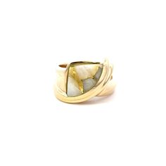 A natural gold in white quartz ring.  Bezel set in the center of the ring is a piece of white quartz with natural gold veins.  The ring has an asymmetrical swirl design and a Euro style shank. This ring is a size 6.75.  This ring cannot be sized by our goldsmith. Metal Content Guaranteed 14k yellow gold Weight: 9.4 grams Measurements of Ring 1/2 inches wide at top (12mm) 3/16 inches off the finger (5mm) 3.3mm wide shank at bottom White Modern Twist Ring Jewelry, White Open Ring With Tension Setting, White Rings With A Modern Twist As A Gift, Modern Twist White Ring As Gift, Modern Twist White Rings As Gift, Modern White Jewelry, Unique White Rings With Polished Finish, White Jewelry With A Modern Twist For Anniversary, Modern White Opal Gemstone Ring