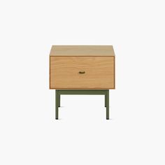 a wooden nightstand with two drawers on one side and an open drawer on the other