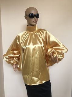 "This is a very stylish Womens Satin blouse. It is comfortable and cozy. Made for a free flowing fit. Great for all year around and for any special occasion or casual day can be dressed up or dressed down. SIZE CHART SIZE S - US 6, UK 8, EU 36 bust: bust around 34.5\"/90cm Waist: waist around 27.5\"/70cm Hips: hips around 34.5\"/90cm SIZE M - US 8, UK 10, EU 38 bust: bust around 37.5\"/95cm Waist: waist around 29.5\"/75cm Hips: hips around 37.5\"/95cm SIZE L - US 10, UK 12, EU 40 bust: bust arou Satin Tops For Party, Gold Silk Blouse For Fall, Gold Fitted Blouse For Fall, Silk Party Top With Puff Sleeves, Satin Puff Sleeve Tops For Night Out, Spring Gold Silk Top, Gold Silk Top For Spring, Gold Silk Tops For Spring, Chic Gold Blouse For Fall