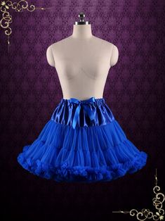 a mannequin with a blue skirt on it