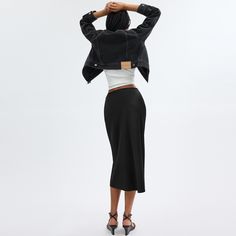 Slip into easy elegant style with this ‘90s-inspired bias-cut satin midi skirt. Finished with a hidden zipper closure the versatile design is detailed with our embroidered cursive Coach script at the waistband for a subtle heritage touch. Sleek Spring Pencil Skirt, Midi Length, Sleek Spring Pencil Skirt With Lining, Sleek Lined Pencil Skirt For Spring, Sleek Spring Lined Pencil Skirt, Sleek Long Pencil Skirt For Spring, Sleek Spring Midi Skirt, Sleek Spring Midi-length Bottoms, Sling Bag Mini, Satin Midi Skirt