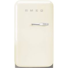 a white refrigerator freezer sitting on top of a counter