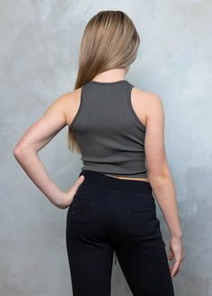 The RHEA Racerback Crop Tank Top offers ample stretch and features a high neck and racerback cut. The ribbed texture ensures lasting durability and offers a snug, comfortable fit. The crop design is perfect for tween sizes and active lifestyles. One Size Fits All Age: 10 years old Crop Design, Casual Bottoms, Age 10, Crop Tank Top, Ribbed Texture, Sleepwear & Loungewear, Basic Tops, Ribbed Fabric, Cropped Tank Top