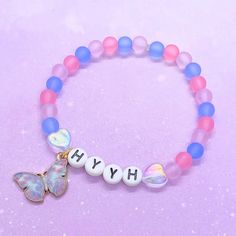 "Beaded stretch bracelet with ethereal pastel color palette inspired by BTS's album the most beautiful moment in life <3 🦋 ✨Comes with freebies so lmk who your bias is in the personalization box or order note! ✨Made with beautiful frosted matte beads  ✨Charm is lead free and nickel free zinc alloy and measures about 20 x 15mm ✨Elastic stretch cord knots are secured with glue ✨Bracelet circumference is 6.5\" unless you request a resizing in the personalization box or order note (please see FAQ f Bts Beaded Bracelet, Bts Bracelet, Bts Hyyh, Beads Butterfly, Pastel Color Palette, Bracelet Inspo, Beads Charm, Pastel Colour Palette, Cute Bracelets