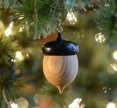 a wooden ornament hanging from a christmas tree