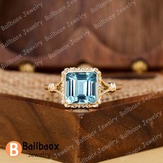 "MADE TO ORDER * Material: Solid gold(10K/14K/18K white/yellow/rose gold), Platinum, 925 Sterling Silver * DETAILS - Center Stone: Natural Blue Topaz - Center Stone Size: Radiant Cut 8*8mm - Center Stone  Carat Weight: Approx 3.0ct - Band Width: 1.6 mm * Click on the \"Pin It\" icon if you like this item ✥ O T H E R ∙ I N F O R M A T I ON ✥ ♦ Your item will be nicely packed to gift in elegant jewelry boxes. ♦ Custom Order We can make custom rings in almost any shape and style. If you want a specific model, please send us a clear picture and we will do our best. ♦ Shipping Most items take 3-4 weeks to create.I'm happy to rush your order, fees may apply, write me for details. ♦ Payment Plans I offer payment plans. The minimum per payment will be $100. Write me your finger size, metal color, Yellow Gold Aquamarine Rings For Anniversary, Yellow Gold Blue Topaz Rings With Emerald Cut, Gold Rings With Halo Setting And Blue Topaz, Yellow Gold Topaz Birthstone Ring For Gift, Yellow Gold Emerald-cut Blue Topaz Ring, Yellow Gold Topaz Birthstone Ring As Gift, Yellow Gold Emerald Cut Blue Topaz Rings, Gold Aquamarine Diamond Ring With Gemstones, Yellow Gold Aquamarine Ring As Gift