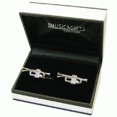 Silver Plated Trumpet Cufflinks. Let That Special Guy In Your Life Blow His Horn With A Little More Confidence As He Plays In These. Makes For A Great Musical Gift! Brand New Handmade In England. Presented In A Beautiful Gift Box. Silver Plated. 1/2" H X 1" W Tags: Music Gift, Music Accessory, Music Themed, Trumpet, Brass, Band, Orchestra, Cufflinks, Links, Suit, Men's Skull Cufflinks, Initial Cufflinks, Musical Gift, More Confidence, Fancy Dress Up, Silver Bling, Brass Band, Etched Designs, Music Accessories