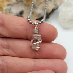 "Beautiful raw Lake County Diamond wrapped with sterling silver wire includes a stainless steel ball chain or a black or brown faux suede adjustable cord (adjusts from about 12\"-24\") If you prefer a sterling silver chain, you can find them here - https://www.etsy.com/listing/757293463/sterling-silver-rolo-chain?ga_search_query=chain&ref=shop_items_search_1 ◇ Meaning As a type of Quartz, Lake County Diamonds exhibit the properties of Quartz such as protection, energy, and power. Lake County Minimalist Adjustable Wire Wrapped Crystal Necklaces, Adjustable Wire Wrapped Sterling Silver Necklace, Adjustable Sterling Silver Wire Wrapped Necklace, Adjustable Nickel-free Round Pendant Crystal Necklace, Adjustable Silver Wire-wrapped Crystal Necklace, Adjustable Sterling Silver Crystal Necklaces For Healing, Adjustable Silver Crystal Necklace Gift, Silver Adjustable Crystal Necklace For Gift, Adjustable Silver Crystal Spiritual Necklace