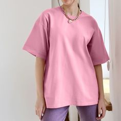 Size Bust(cm) Shoulder(cm) Sleeve(cm) Length(cm) M 100 48 19 68 L 106 50 20 70 XL 112 52 21 72 XXL 118 54 22 74 Introducing our latest summer collection: the Solid Color Cotton Short-Sleeve T-Shirt. Made from 100% cotton, this shirt offers a soft and comfortable feel, perfect for all-day wear. Its fashionable yet simple design makes it easy to style for any occasion, whether it's a casual outing, a day at work, or a holiday celebration. This versatile piece is a wardrobe essential, ideal for dai Oversized Basic Solid Color T-shirt, Oversized Solid Color Crew Neck T-shirt, Oversized Solid Crew Neck T-shirt, Basic Solid Color Relaxed Fit T-shirt, Basic Relaxed Fit Solid Color T-shirt, Pink Solid Color T-shirt For Spring, Basic Plain Drop Shoulder T-shirt, Basic Plain Pink T-shirt, Basic Pink Plain T-shirt