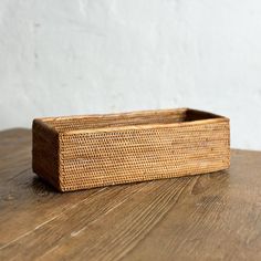 a wooden box sitting on top of a table