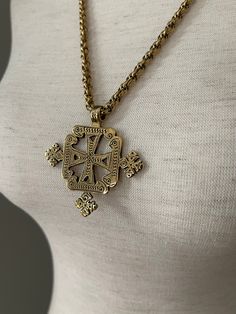 Vintage Gold Tone Long Pendant Necklace If held with clasp closed, chain hangs 14 1/4in long Pendant is 2 1/4in by 2 1/4in Luxury Antique Gold Chain Necklace, Chunky Cross Necklace, Long Pendant Necklace, Long Pendant, Vintage Gold, Cross Necklace, Jewelry Necklace Pendant, Gold Color, 1970s