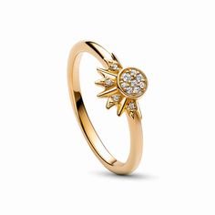 Radiate summer energy with the Celestial Sparkling Sun Ring. This hand-finished ring glows in 14k gold-plating, with a sun motif in the centre formed by a circle of clear pavé with rays emanating from one side. Wear it by itself as a symbol of energy, positivity and life, or stack it with its counterpart, the Celestial Blue Sparkling Moon Ring. The two rings fit perfectly together, representing duality and harmony in nature and within ourselves. Disney Jewelry Rings, Sun Ring, Moon And Star Ring, Charms Pandora, Daisy Ring, Moon Ring, Disney Jewelry, Star Jewelry, Star Ring