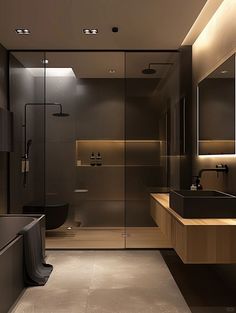 a modern bathroom with black and beige decor