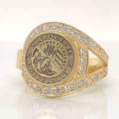 14k Gold College Ring, University Ring , Graduation Gift , Graduation Ring , Woman Ring , Signet Rİng, Chiristmas Gift, Woman Class Rings This product is GUARANTEED for life. - College graduation rings for men and women delicately engraved with your school logo or any other initials or image you want. - The ring has solid back. Deep and detailed engraving very delicately handcrafted unisex - looks super cool on both women & men - The ring is 925 Silver - Please contact me for your 14 carat and 1 Heirloom Gold Halo Ring, Heirloom Gold Engraved Ring For Commemoration, Elegant Gold Ring For Commemoration, Gold Cluster Ring With Halo, Heirloom Gold Cluster Ring With Halo Setting, Elegant Yellow Gold Rings For Commemoration, Gold Cubic Zirconia Cluster Ring For Anniversary, Heirloom Gold Diamond Halo Ring, Heirloom Gold Halo Diamond Ring