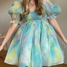 Who Doesn't Love A Dress That’s Equally As Cute As It Is Comfortable! Our Deep Summer Puff Sleeve Babydoll Dress Is A Tie Dye Base In Green And Blue. The Babydoll Silhouette And Square Neckline Make This Dress So Cute & Fun! Measurements: S - Bust 30", Sleeve Length 11.5", Length 30" M - Bust 33", Sleeve Length 12", Length 30" L - Bust 34", Sleeve Length 12.5", Length 30" Multicolor Puff Sleeve Summer Dress, Multicolor Puff Sleeve Dress For Spring, Cute Puff Sleeve Dress For Garden Party, Cute Puff Sleeve Dress For Spring Garden Party, Cute Puff Sleeve Mini Dress For Garden Party, Cute Mini Length Puff Sleeve Dress For Garden Party, Trendy Puff Sleeve Spring Dresses, Cute Square-neck Puff Sleeve Dress For Spring, Casual Multicolor Puff Sleeve Dress For Spring