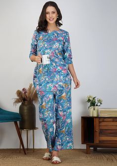 Embrace elegance and comfort with our Flowing Abstract on Blue Cotton Loungewear Dress. This sophisticated two-piece outfit features a flowing abstract design on soft, breathable cotton, perfect for summer. This top and pants suit transitions effortlessly from casual to chic loungewear, ideal for women who value style and ease. 🧵 Quality: Our Loungewear Set is made from 100% premium cotton, ensuring maximum softness and breathability. The fabric feels gentle against the skin, making it ideal for a restful night's sleep or a relaxed day at home. The set features a classic cut and durable stitching for long-lasting comfort. ⏳ Production Time: Please note that each loungewear set is made to order with a 1-3 days lead time for production. This ensures that you receive a fresh, high-quality pr Blue Fitted Sets With Long Pants, Blue Long Sleeve Pant Set For Work, Blue Loungewear Sets With Long Pants, Blue Long Pants Sets For Summer, Blue Pant Set For Spring Workwear, Cotton Workwear Sets, Blue Long Sleeve Loungewear Pant Set, Blue Long Sleeve Pant Set For Loungewear, Blue Cotton Workwear Sets