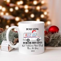 a white coffee mug with the words i'm not saying im better than santa but when we stole that one