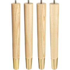 three wooden posts with metal tips are lined up