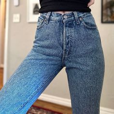 Vintage Levi 17501 jeans in a medium subtle stone wash. Button fly. Tapered/fitted leg. 100% cotton SIZING: Tagged size: 5 Actual waist: 12.5" across lying flat Recommended for: 24 (relaxed) or 25 (snug) waist. Rise: 10.25" Across hips: 18.5" Inseam: 31" In good preloved shape with no stains/rips. Some wear to patch on back. See pics for best description. For reference, I am wearing in photos. My waist is approx. 25.5" and I am 5'7". Mid-rise Fitted Washed Cropped Jeans, Mid-rise Washed Cropped Jeans, Fitted Mid-rise Washed Cropped Jeans, Fitted Washed Jeans With Standard Cut Leg, Classic High Rise Medium Wash Bottoms, Fitted Cropped Jeans With Tapered Leg In Medium Wash, Faded Fitted Mid-rise Jeans, Classic Light Wash Cropped Denim Jeans, Classic Washed Faded Flare Jeans