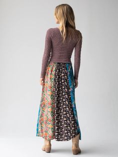 We are obsessed with MIXED PRINTS! This gorgeous Valentina Maxi Skirt in Turquoise Mixed Print is the perfect piece to express your boho spirit and express your unique self! The vertical striped panels of beautiful floral prints make this skirt so fun to wear - it looks so effortlessly cool when paired with any of our tops, and don't be afraid to mix and match for a super unique and fashionable outfit! The flat front elastic waistband and A-line shape create the most flattering, flowy fit that w Blue Patchwork Skirt For Fall, Mixed Prints, Yellow Cream, Feminine Beauty, Brown Floral, Bohemian Clothes, Vertical Stripes, Mixing Prints, Boho Tops