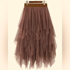 New With Tags Boho Ballerina Brown Tulle Tiered Skirt. One Size. Elastic Closure. Fits Size 4, 6, 8 And 10. Midi Length. Stylish! Asymmetrical High Low Mesh Ruffle Free People Anthropologie Tulle Tiered Midi Boho Ballerina Skirt Boho Tiered Skirt Tulle Skirt Anthropologie Tiered Skirt Anthropologie Tulle Skirt Asymmetrical Skirt Mesh Skirt Womens Tulle Skirt, Gonna In Tulle, Asymmetrical Midi Skirt, Gauze Skirts, Skirt Tulle, Fishnet Dress, Tulle Tutu Skirt, Ballet Tutu, Elegante Casual