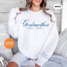 Custom Godmother With Kids Names Sweatshirt | Godmother Crewneck | Godmother Gift | Godmother Proposal Shirt | Godmom Hoodie | Madrina Gift Our handmade Custom Godmother With Kids Names sweatshirts ship the same or next business day and are made to order just for you! Our trendy Godmother hoodies are made from an ultra soft 50/50 blend which will quickly make this your go to Godmom crewneck! We print all our threads with 100% eco-friendly water based ink. This means our ink is PVC free, safer to wear, and more sustainable for the environment. This makes all our garments both incredibly breathable and super long lasting! ♥Details♥ - 50/50 blend premium sweatshirt - Hand pressed with eco-friendly water-based ink ♥ Sizing ♥ -All our sweatshirts are unisex sizing.  -For a more fitted look, we Godmother Proposal, Godmother Gifts, Kids Names, Overland Park, Godmother, Kid Names, 50 50, Gender Neutral, Custom Made