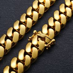 Introducing Different Drip’s 20mm Solid 18k Gold Plated Miami Cuban Link Chain. This striking piece will shine up the room from all angles with its glistening hand-set stones. You're guaranteed to stand out while rockin' this unique piece. Only found at Different Drips. Product Type: Necklaces Gender: Unisex Material: 18k Gold Plated Luxury Cuban Link Chain Necklace With Polished Finish, Luxury Yellow Gold Cuban Link Necklace Tarnish Resistant, Luxury Cuban Link Necklace With Polished Finish As Gift, Luxury Gold Cuban Link Necklace For Formal Occasions, Luxury Gold Cuban Link Necklace For Formal Events, Luxury Tarnish-resistant Yellow Gold Cuban Link Necklace, Gold Cuban Link Necklace With Solid Links As Gift, Luxury Cuban Link Necklace With Polished Finish, Luxury Gold Cuban Link Necklace With Solid Construction